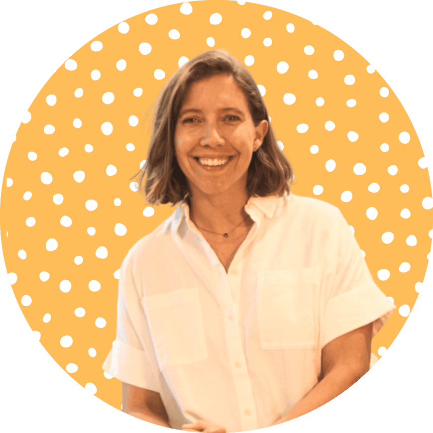 Smiling person with a polka dot background