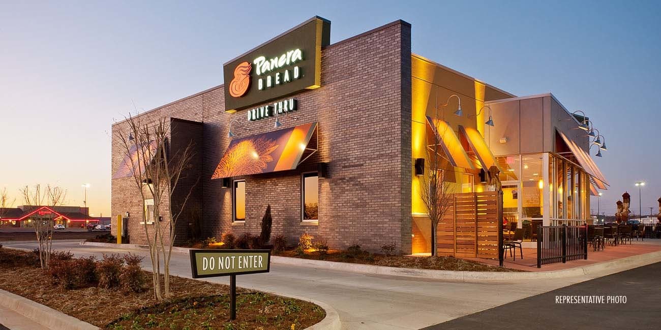 Exterior of a modern restaurant building at dusk