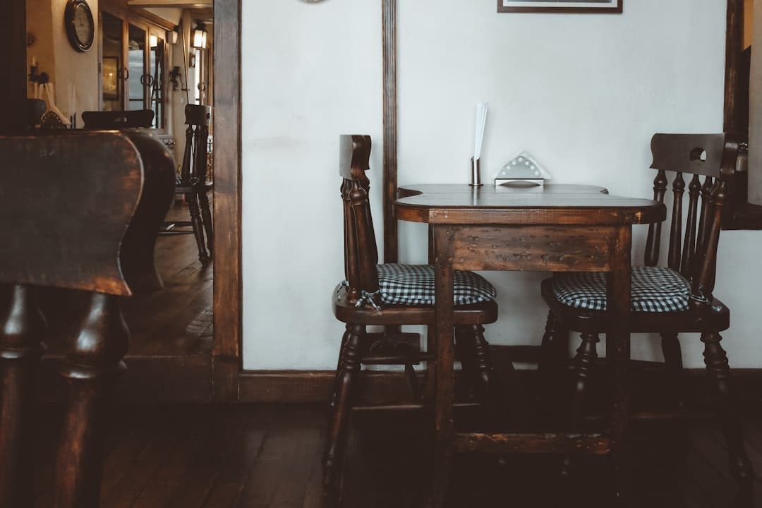 Cozy rustic dining table and chairs in cafe