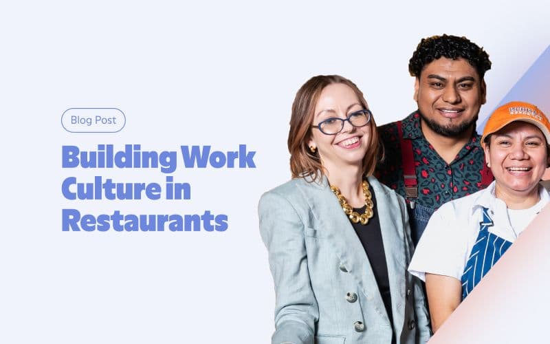 Group of restaurant workers smiling in uniform