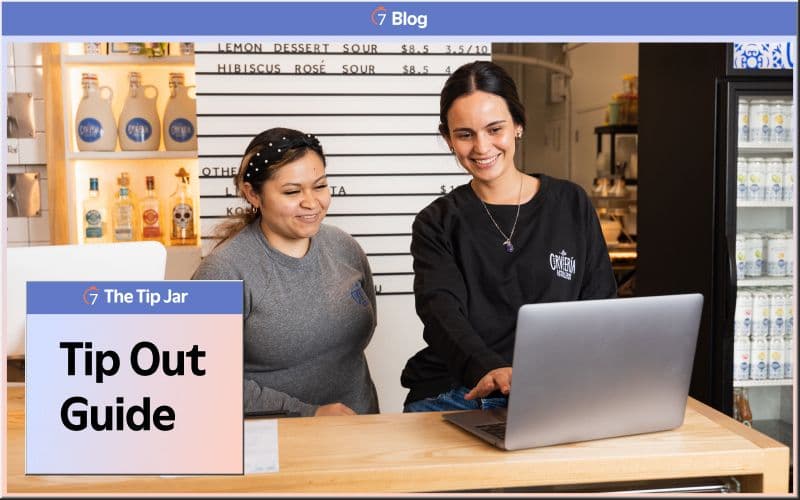 Two women reading 'Tip Out Guide' on laptop