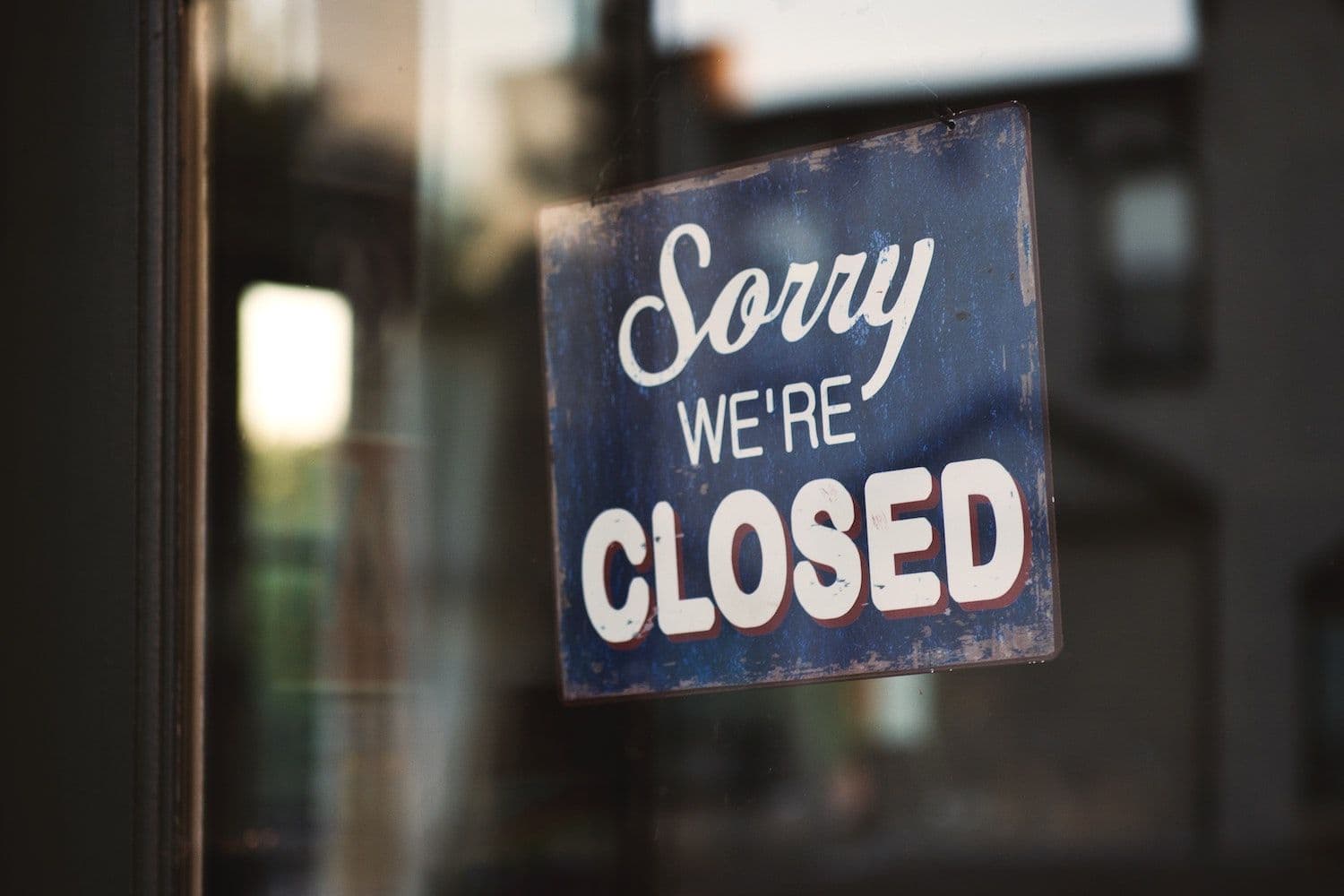 Closed sign on a shop window