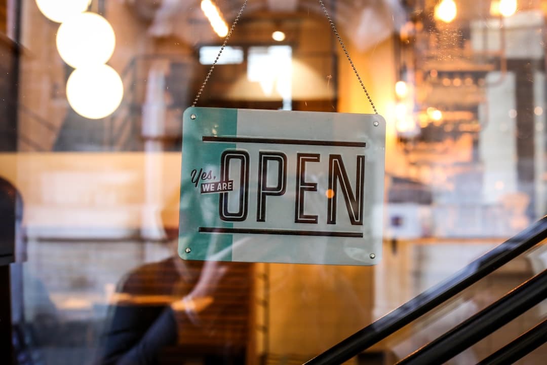 Shop with open sign on glass door