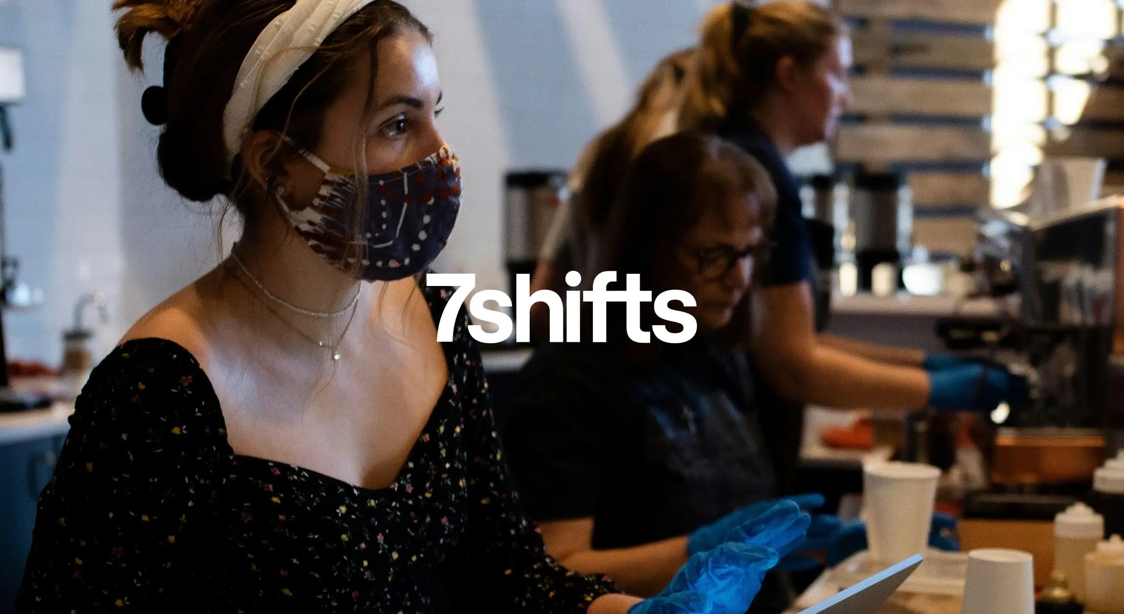Cafe staff working with masks and gloves