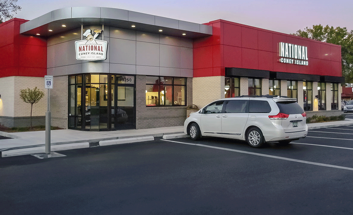 National Coney Island restaurant exterior with parked minivan.