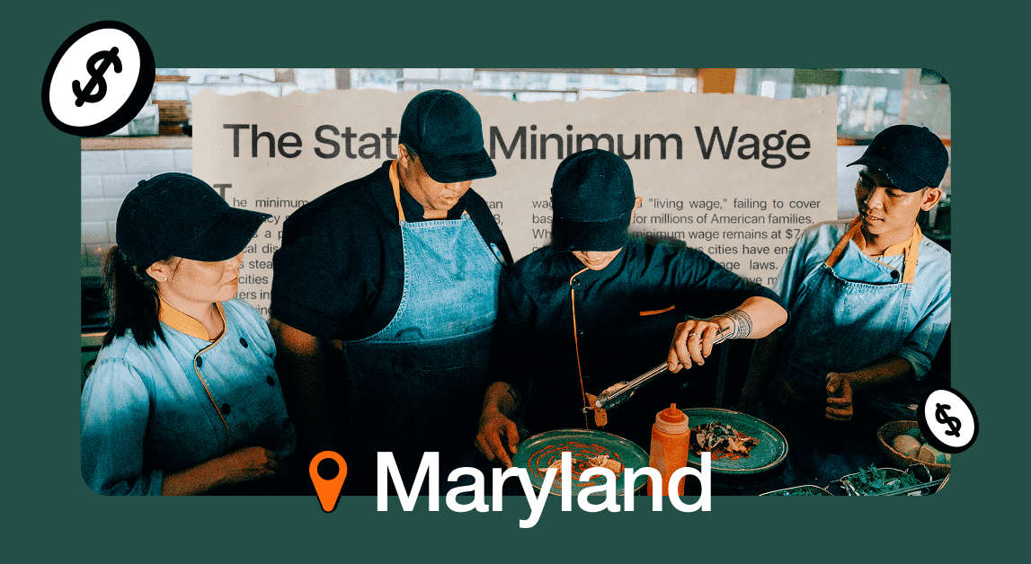 Workers preparing food in Maryland restaurant.