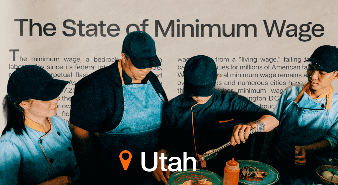 Workers cooking in restaurant, Utah minimum wage context.