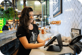 Steamwhistle brewery employee using POS system